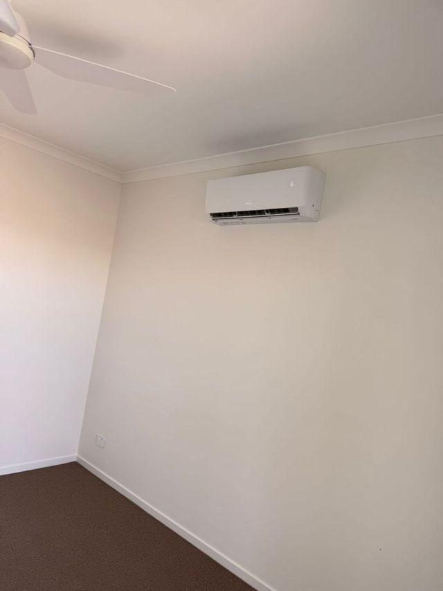 Wall mounted split system air conditioner installed by GTA Aircon and Electrical in Brisbane