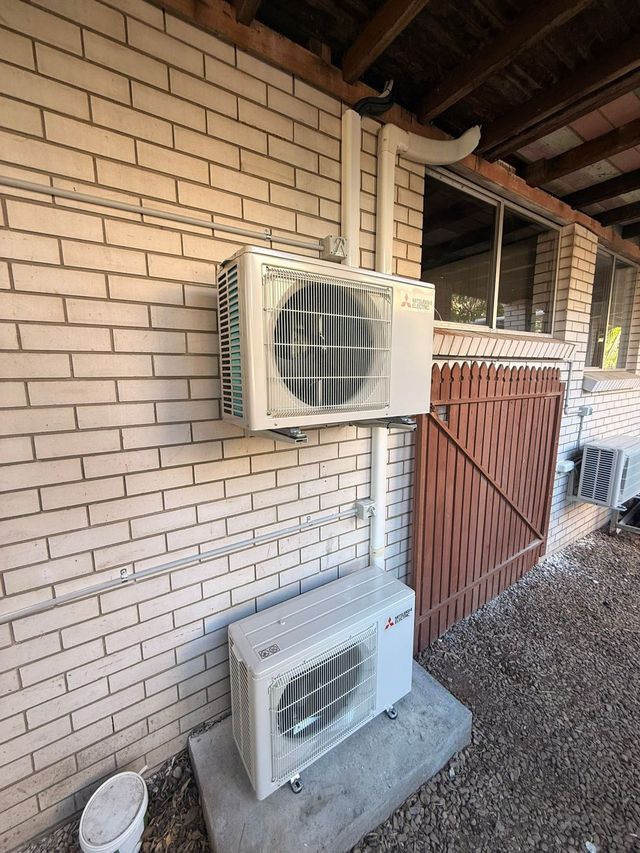 Outdoor air conditioning condenser unit installed by GTA Aircon and Electrical in Brisbane
