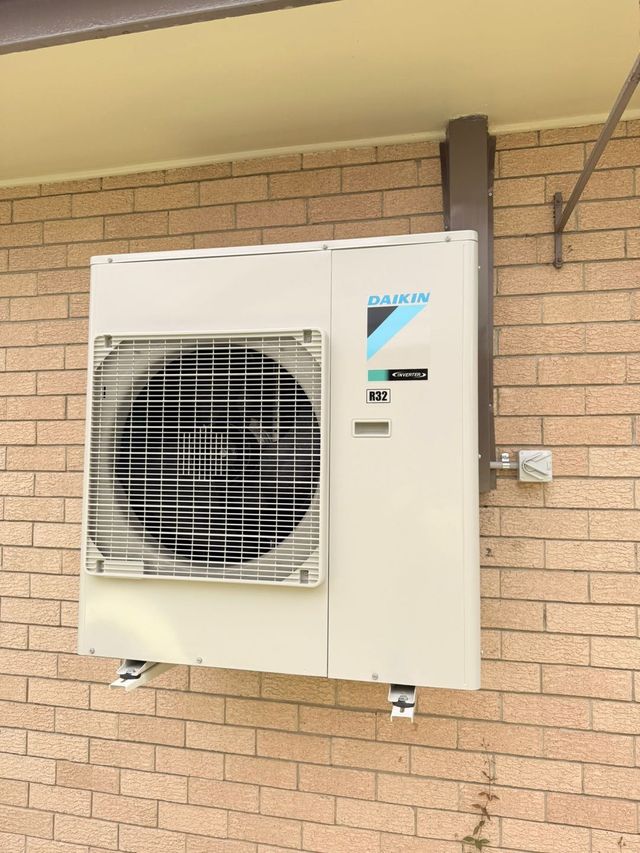 Outdoor air conditioning condenser unit installed by GTA Aircon and Electrical in Brisbane