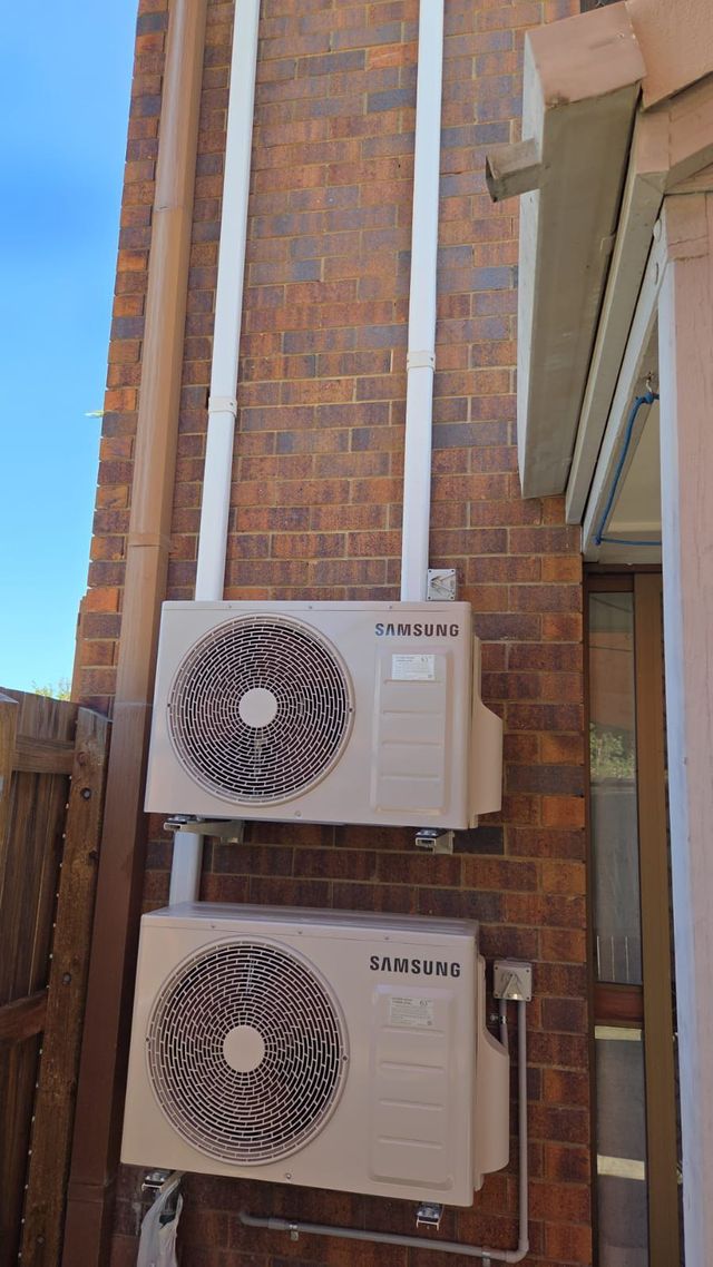 Outdoor air conditioning condenser unit installed by GTA Aircon and Electrical in Brisbane